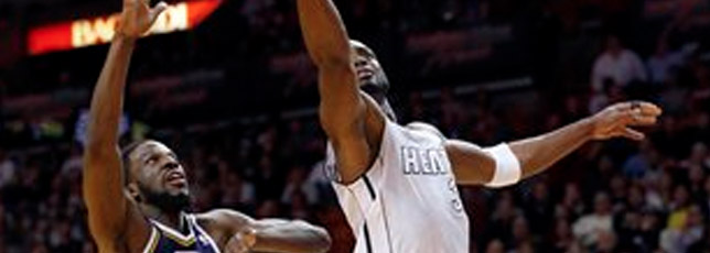 Heat win again, top Jazz 105-89