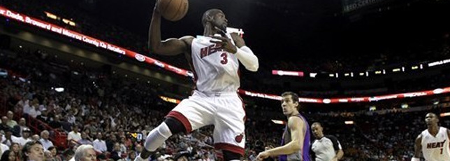 Heat roll past Suns, 124-99